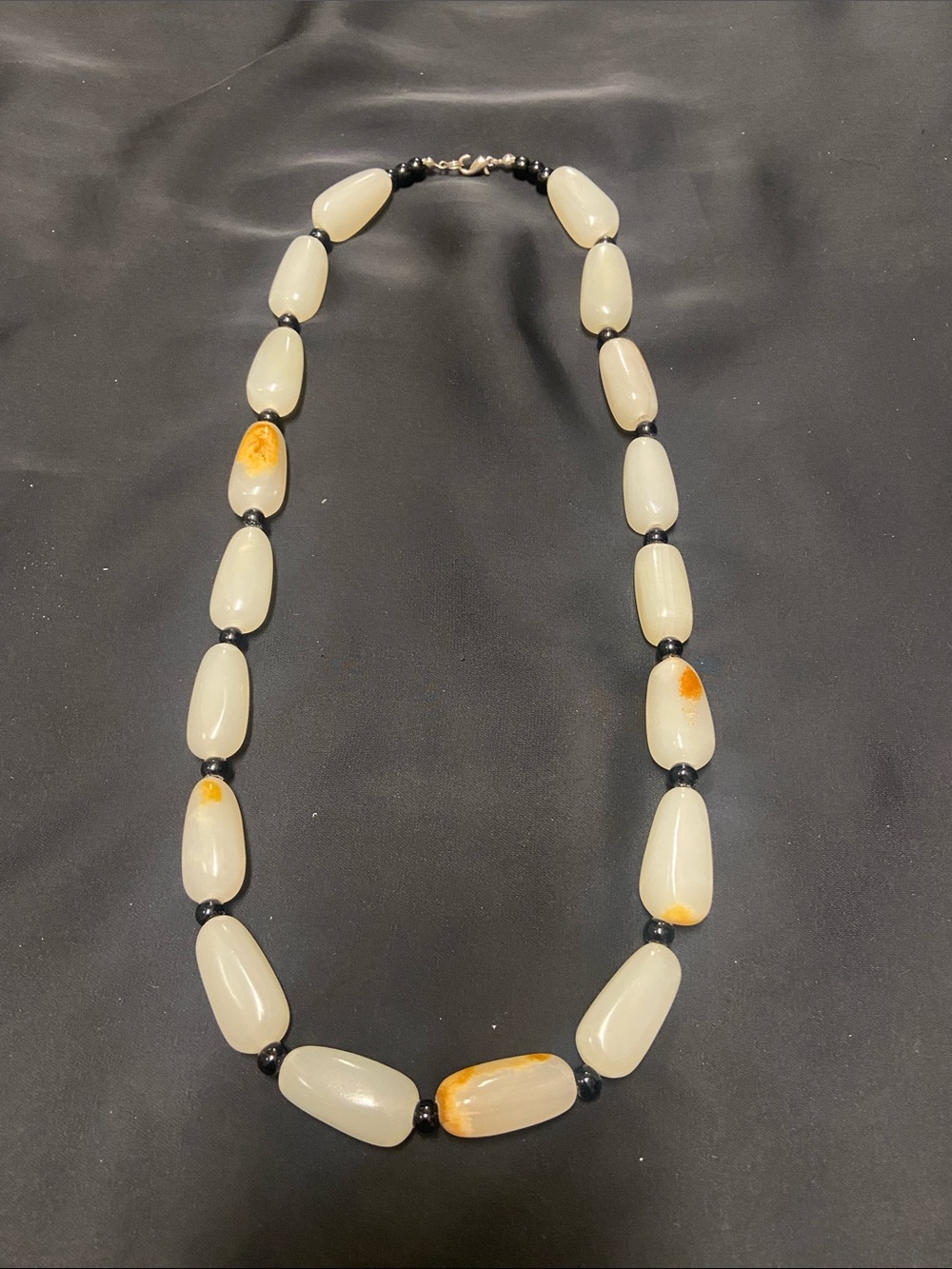 Cream and Amber Beaded Necklace with Black Accents